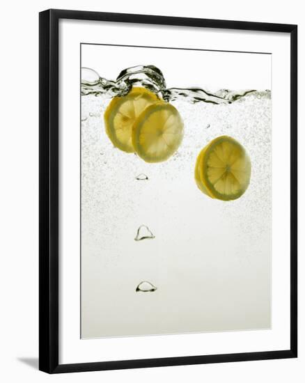 Lemon Slices in Water-Paul Blundell-Framed Photographic Print