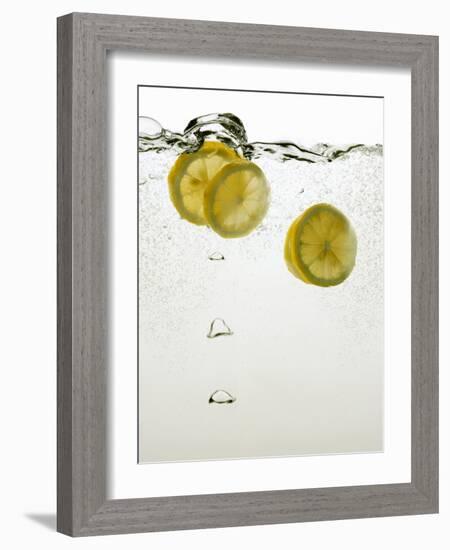 Lemon Slices in Water-Paul Blundell-Framed Photographic Print