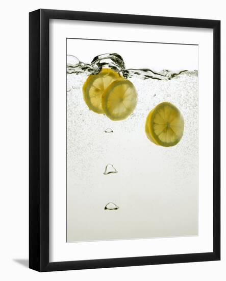 Lemon Slices in Water-Paul Blundell-Framed Photographic Print