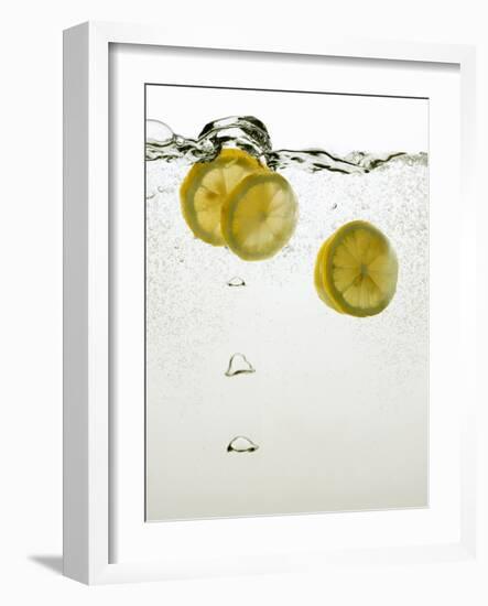 Lemon Slices in Water-Paul Blundell-Framed Photographic Print