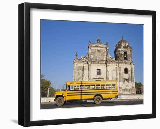 Leon, American Yellow Bluebird Bus Driving Past San Juan Church, Nicaragua-Jane Sweeney-Framed Photographic Print
