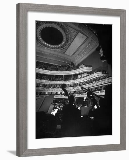 Leopold Stokowski Conducting the New York Philharmonic Orchestra at Carnegie Hall-Gjon Mili-Framed Premium Photographic Print