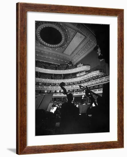 Leopold Stokowski Conducting the New York Philharmonic Orchestra at Carnegie Hall-Gjon Mili-Framed Premium Photographic Print