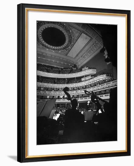 Leopold Stokowski Conducting the New York Philharmonic Orchestra at Carnegie Hall-Gjon Mili-Framed Premium Photographic Print