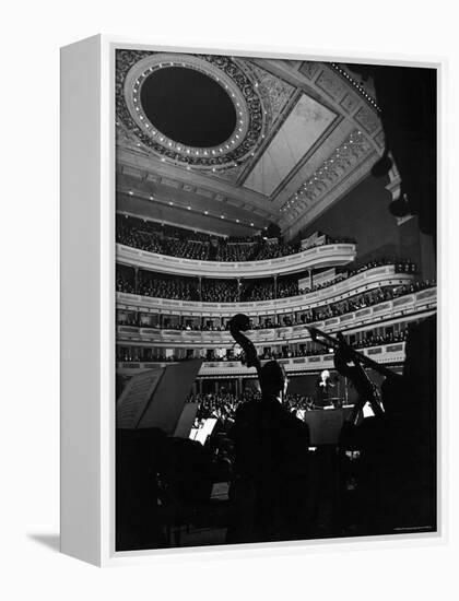 Leopold Stokowski Conducting the New York Philharmonic Orchestra in Performance at Carnegie Hall-Gjon Mili-Framed Premier Image Canvas