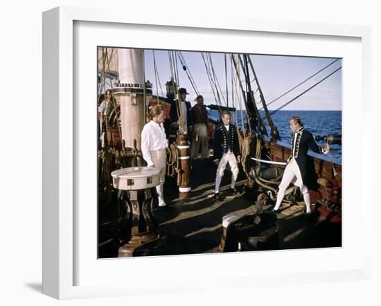 Les revoltes du Bounty MUTINY ON THE BOUNTY by LewisMilestone and CarolReed with Marlon Brando and -null-Framed Photo