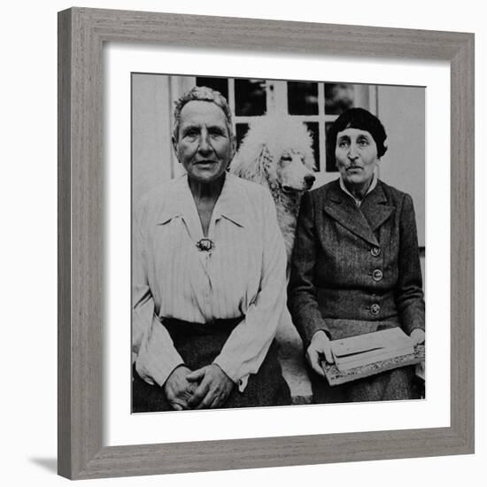 Lesbian Authors Gertrude Stein and Alice B. Toklas with their Poodle Basket II-Carl Mydans-Framed Premium Photographic Print