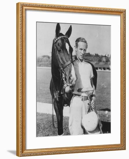 Leslie Howard in Riding Gear at Racetrack-null-Framed Premium Photographic Print