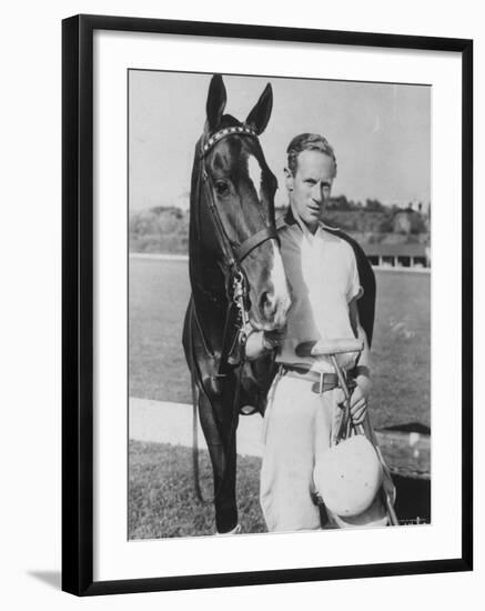 Leslie Howard in Riding Gear at Racetrack-null-Framed Premium Photographic Print