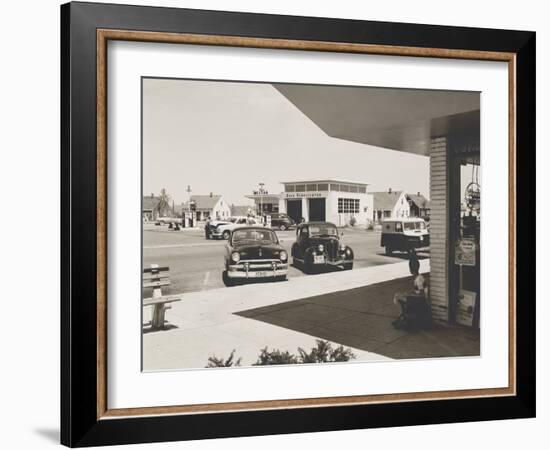 Levittown, N.Y. Corner Store across the Street from a Gas Station-null-Framed Photo