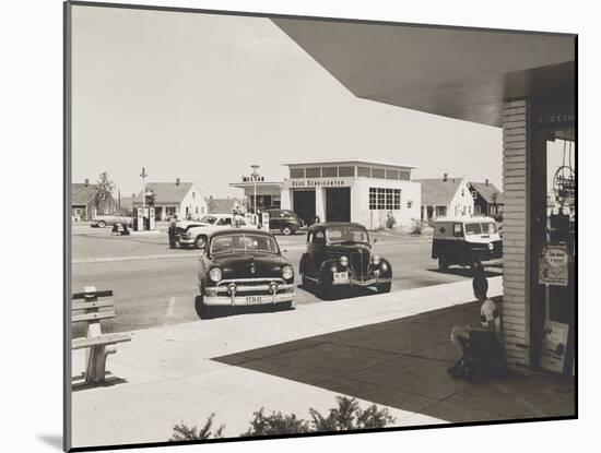 Levittown, N.Y. Corner Store across the Street from a Gas Station-null-Mounted Photo