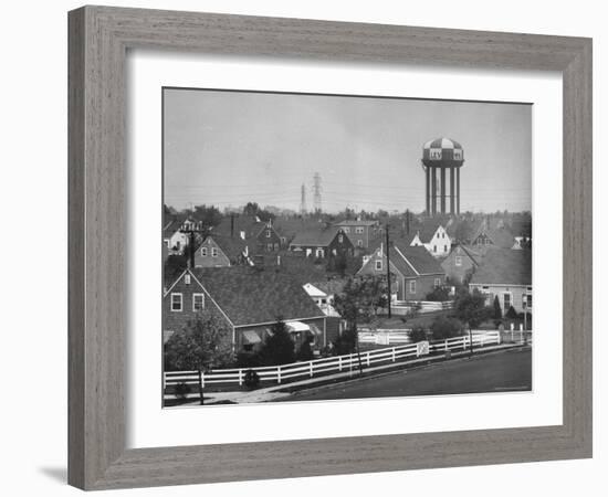 Levittown Water Tank Looming over Middle Class Homes in New Housing Development-Joe Scherschel-Framed Photographic Print