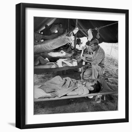 Lew Ayres Treating Wounded Japanese Prisoner in Leyte Cathederal Turned into Hospital, 1944-W^ Eugene Smith-Framed Photographic Print