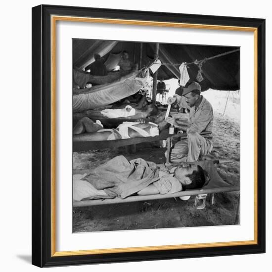 Lew Ayres Treating Wounded Japanese Prisoner in Leyte Cathederal Turned into Hospital, 1944-W^ Eugene Smith-Framed Photographic Print