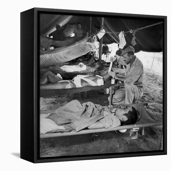 Lew Ayres Treating Wounded Japanese Prisoner in Leyte Cathederal Turned into Hospital, 1944-W^ Eugene Smith-Framed Premier Image Canvas