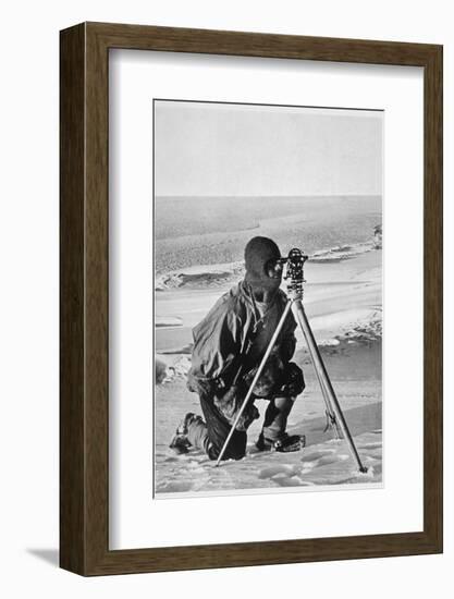 Lieutenant Evans surveying in the Antarctic, 1911-1912-Herbert Ponting-Framed Photographic Print