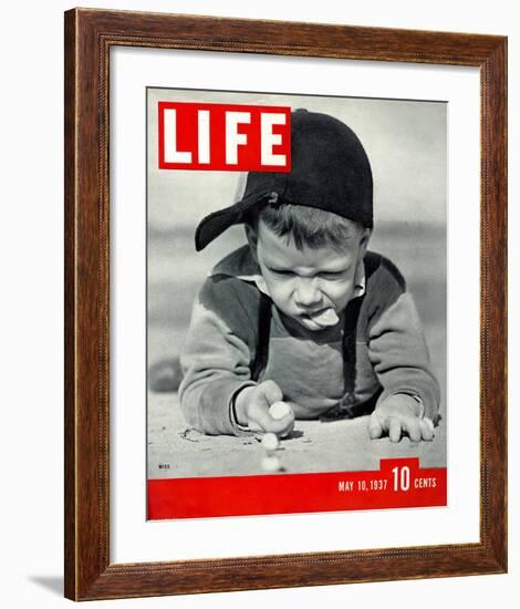 LIFE Boy playing marbles 1937-null-Framed Art Print