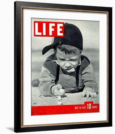 LIFE Boy playing marbles 1937-null-Framed Art Print