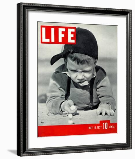 LIFE Boy playing marbles 1937-null-Framed Art Print