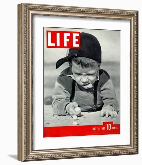 LIFE Boy playing marbles 1937-null-Framed Premium Giclee Print