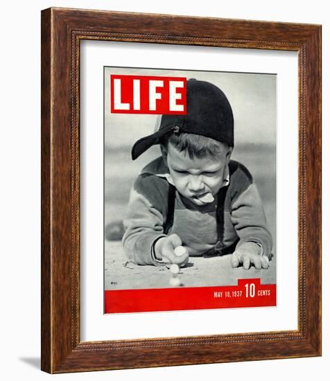 LIFE Boy playing marbles 1937-null-Framed Premium Giclee Print