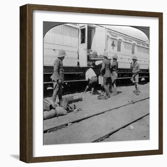 Lifting Wounded Soldiers onto a Hospital Train, East Africa, World War I, 1914-1918-null-Framed Photographic Print