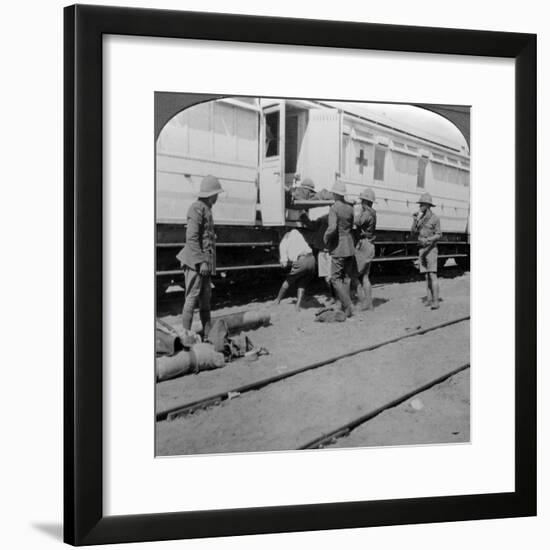 Lifting Wounded Soldiers onto a Hospital Train, East Africa, World War I, 1914-1918-null-Framed Photographic Print