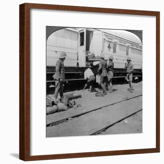 Lifting Wounded Soldiers onto a Hospital Train, East Africa, World War I, 1914-1918-null-Framed Photographic Print