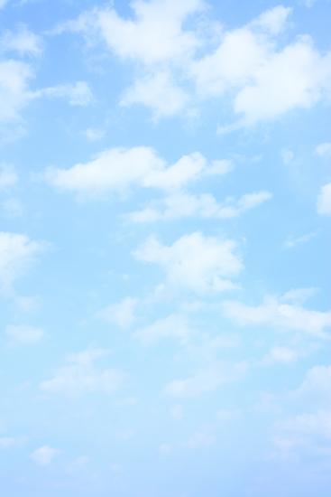 'Light Blue Spring Sky with Clouds, May Be Used as Background