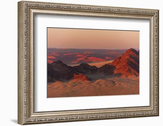 Light illuminates the Naukluft Mountains and Namib Desert at sunrise. Namibia.-Sergio Pitamitz-Framed Photographic Print