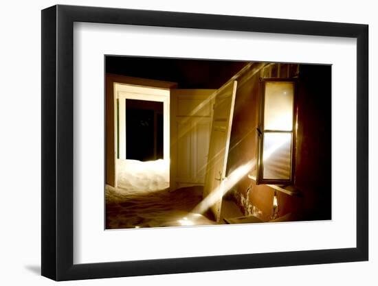 Light Streaming Through Window On Sand Covered House In Kolmanskop Ghost Town-Enrique Lopez-Tapia-Framed Photographic Print