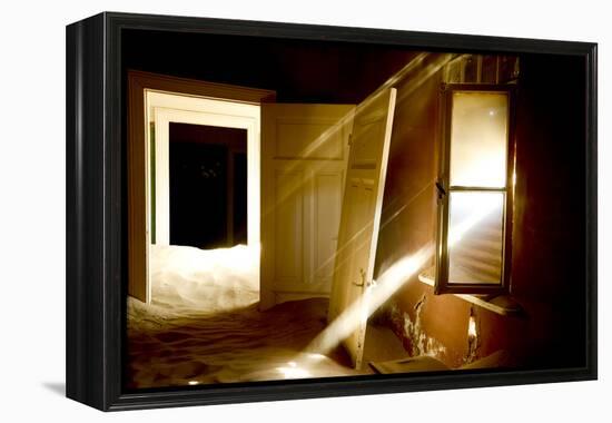 Light Streaming Through Window On Sand Covered House In Kolmanskop Ghost Town-Enrique Lopez-Tapia-Framed Premier Image Canvas