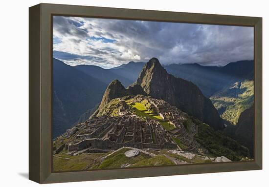 Light Streams Through The Clouds And Lights Parts Of The Ancient City Of Machu Picchu-Joe Azure-Framed Premier Image Canvas