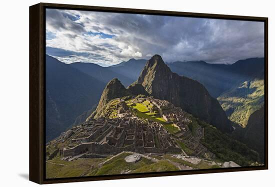 Light Streams Through The Clouds And Lights Parts Of The Ancient City Of Machu Picchu-Joe Azure-Framed Premier Image Canvas