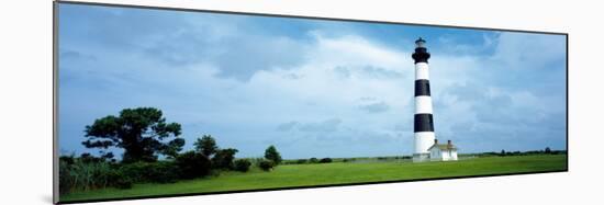 Lighthouse in a Field, Bodie Island Lighthouse, Bodie Island, North Carolina, USA-null-Mounted Photographic Print