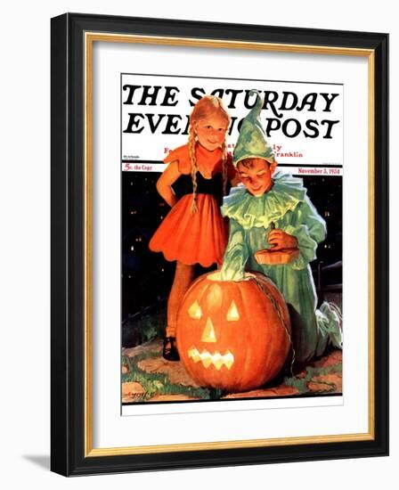 "Lighting the Pumpkin," Saturday Evening Post Cover, November 3, 1934-Eugene Iverd-Framed Giclee Print