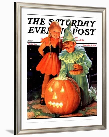 "Lighting the Pumpkin," Saturday Evening Post Cover, November 3, 1934-Eugene Iverd-Framed Giclee Print