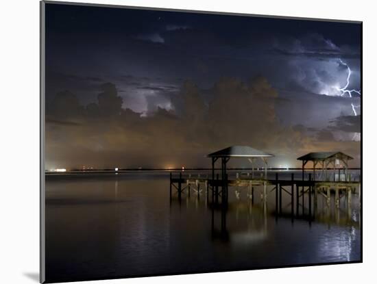 Lightning Off a Dock in Titusville, Florida Looking Towards Cape Canaveral-Melissa Southern-Mounted Photographic Print