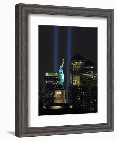 Lights from the Former World Trade Center Site Can be Seen on Both Sides of the Statue of Liberty-null-Framed Photographic Print