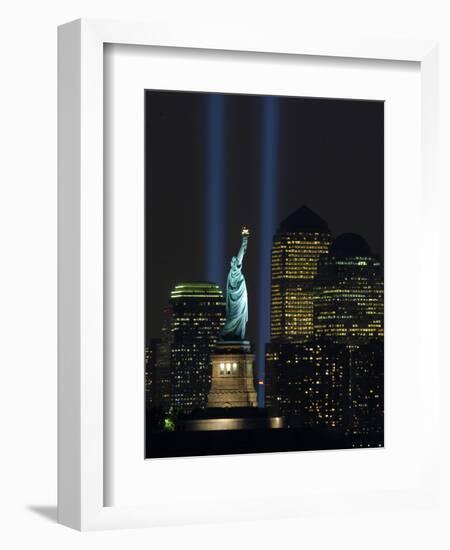 Lights from the Former World Trade Center Site Can be Seen on Both Sides of the Statue of Liberty-null-Framed Photographic Print