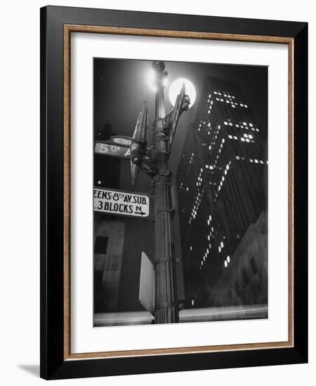 Lights in Skyscrapers at Rockefeller Center Being Dimmed to Conserve Energy During WWII-William C^ Shrout-Framed Photographic Print