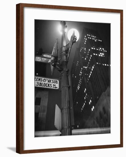 Lights in Skyscrapers at Rockefeller Center Being Dimmed to Conserve Energy During WWII-William C^ Shrout-Framed Photographic Print