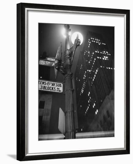 Lights in Skyscrapers at Rockefeller Center Being Dimmed to Conserve Energy During WWII-William C^ Shrout-Framed Photographic Print