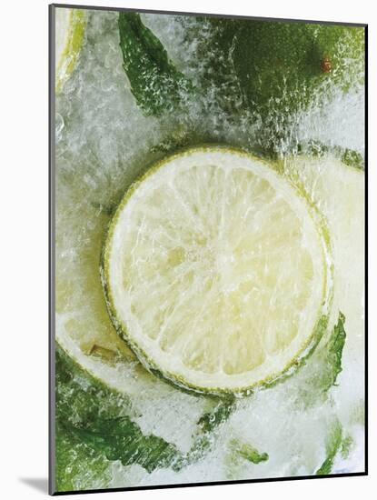 Limes in Block of Ice-Dieter Heinemann-Mounted Photographic Print