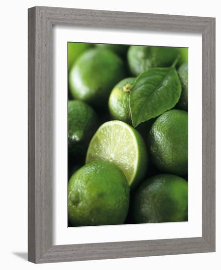 Limes, Several Whole and One Halved-Vladimir Shulevsky-Framed Photographic Print