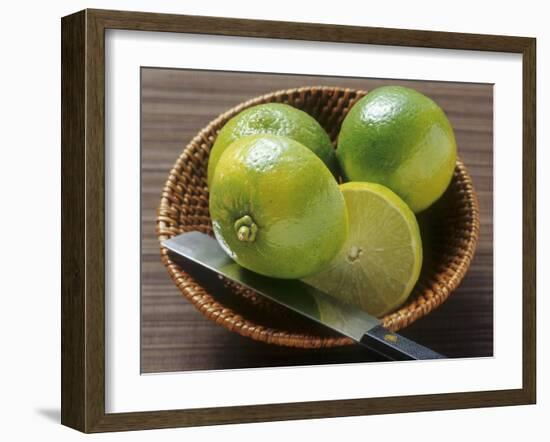 Limes, Two Whole and One Halved in a Small Basket-Eising Studio - Food Photo and Video-Framed Photographic Print