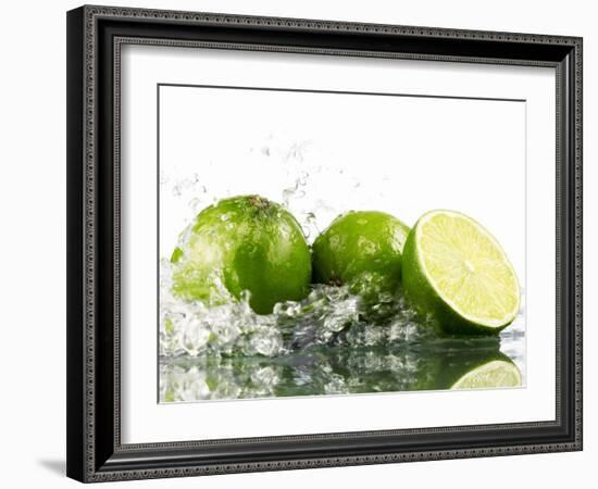 Limes with Splashing Water-Michael L?ffler-Framed Photographic Print