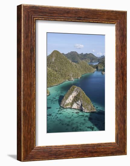 Limestone Islands Surround a Lagoon in a Remote Part of Raja Ampat-Stocktrek Images-Framed Photographic Print
