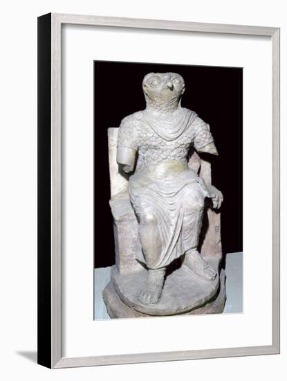 Limestone seated figure of Horus wearing Roman military costume, Egyptian. Artist: Unknown-Unknown-Framed Giclee Print