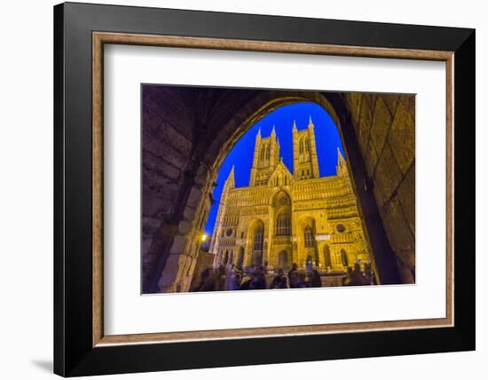 Lincoln Cathedral viewed through archway of Exchequer Gate at dusk, Lincoln, Lincolnshire, England,-Frank Fell-Framed Photographic Print